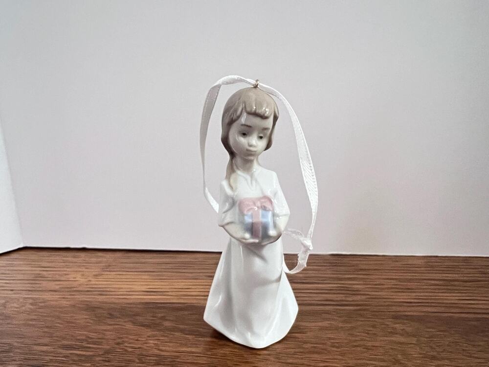 Lladro “Sweet girl with gift” porcelain ornament